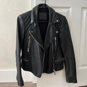 All Saints catch biker